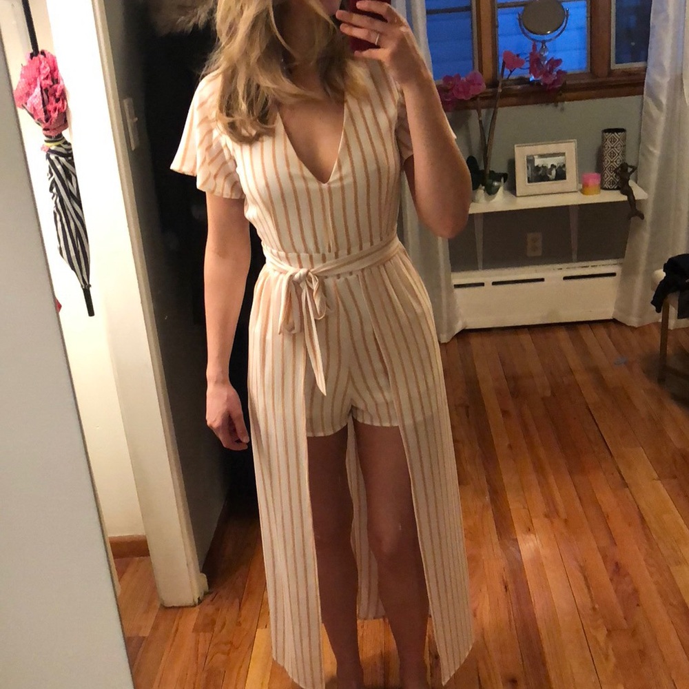 White romper with peach/pink stripe